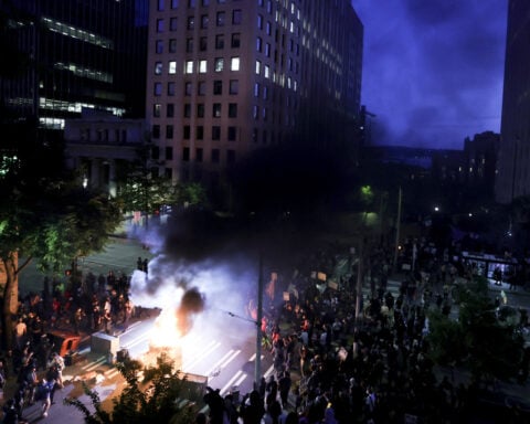 Protests over immigration raids pop up across the US with more planned