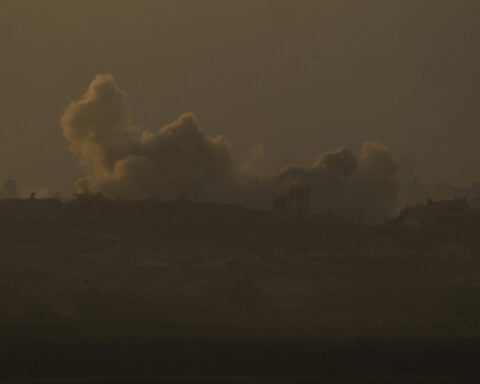 Hamas says it killed 12 Israeli-backed fighters. Israeli-supported group says they were aid workers