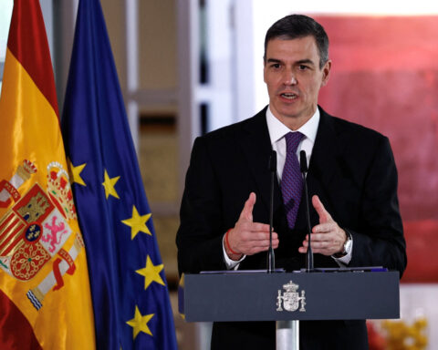 Spain's PM rejects calls for snap election as scandals mount