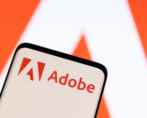 Adobe raises annual forecasts on steady adoption of AI-powered tools