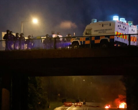 Police attacked as Northern Irish violence spreads to another town