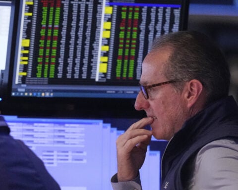 Asian shares slide while oil prices surge after Israel's strike on Iran