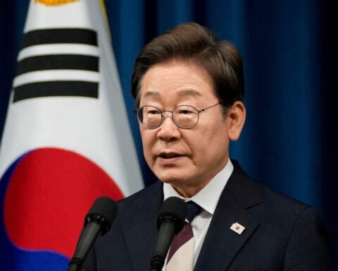 South Korea's Lee pledges support on trade issues in meeting with top conglomerates