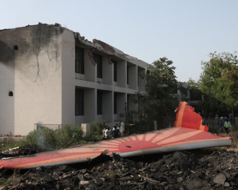 Survivor of Air India crash jumped out of emergency exit, police say