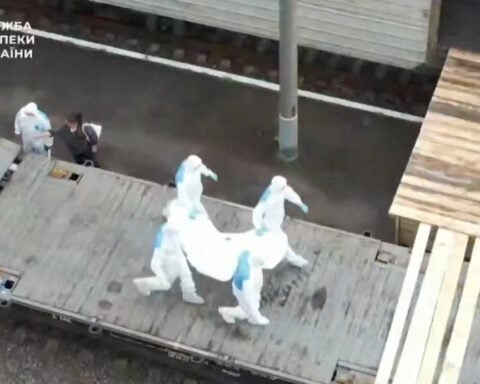 Ukrainians face painful wait to learn if loved ones are among returned bodies