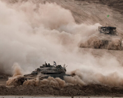 Israeli tanks kill 59 people in Gaza crowd trying to get food aid, medics say