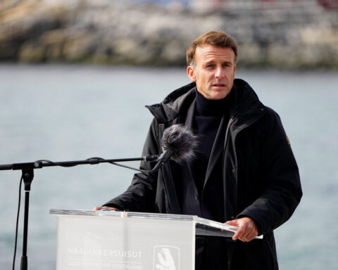 Macron fears regime change chaos as Trump ups threats on Iran