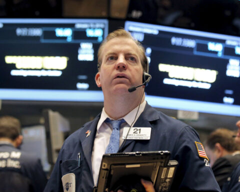 S&P 500 ends nearly flat, gives back gains; Fed's Powell says inflation to rise