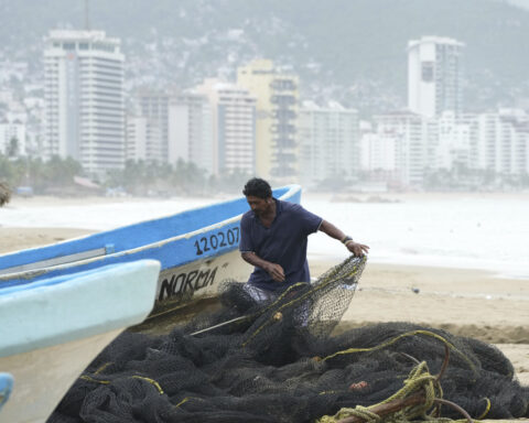 Erick turns rainmaker after hitting Mexico's Pacific coast as a strong hurricane. 1 dead