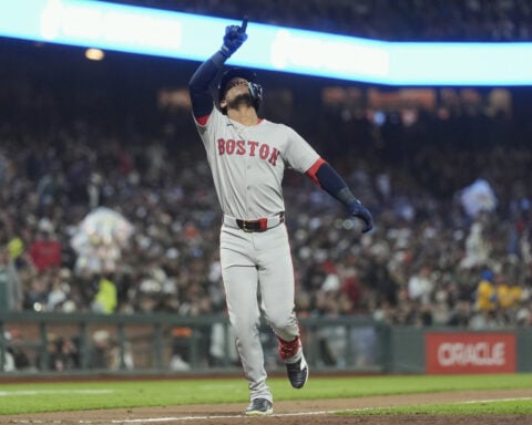 Rafaela hits a tiebreaking homer and Red Sox keep Devers hitless in a 7-5 win over the Giants