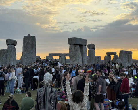Sunrise at Stonehenge draws druids, pagans and revelers to celebrate the summer solstice