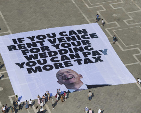 Greenpeace joins anti-Bezos protest with Venice banner complaining about billionaire tax breaks
