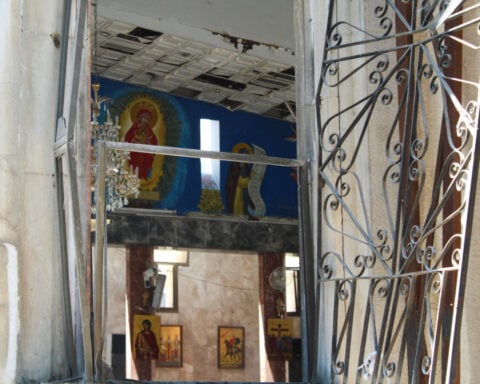 Syria's Christians ask 'Why us?' after suicide bombing at Damascus church