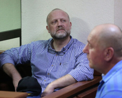 Georgia jails three opposition politicians, including bank founder