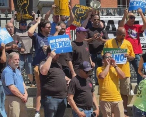 Uber and Lyft drivers rally against driverless taxis