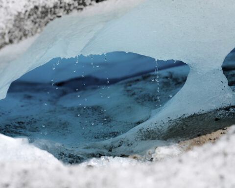Switzerland's ebbing glaciers show a new, strange phenomenon: holes reminiscent of Swiss cheese