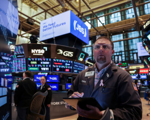 Stocks hit fresh record, dollar weakens to lowest in three years amid Fed worries
