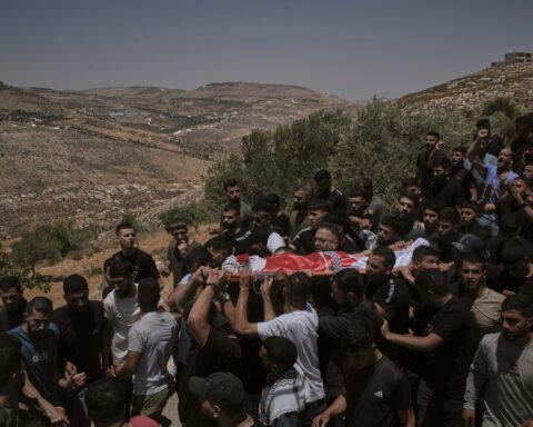 Israeli settlers rampage at a military base in the West Bank