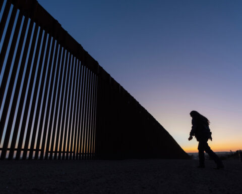 Judge blocks order barring asylum access at border and gives administration two weeks to appeal