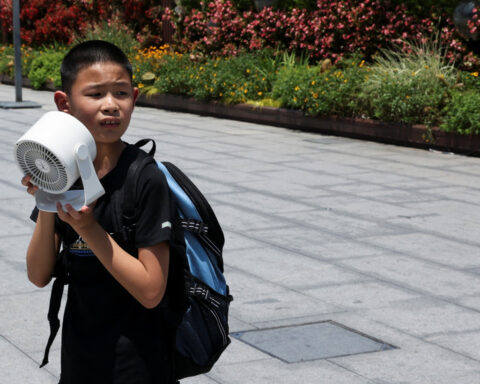 Eastern China swelters under early heatwave, threatening crops and industry