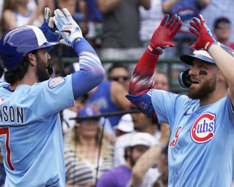 Busch hits 3 homers and Cubs set club record with 8 in 11-3 rout of Cardinals