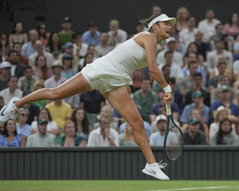 Wimbledon: No. 1 Aryna Sabalenka holds off home favorite Emma Raducanu at Centre Court