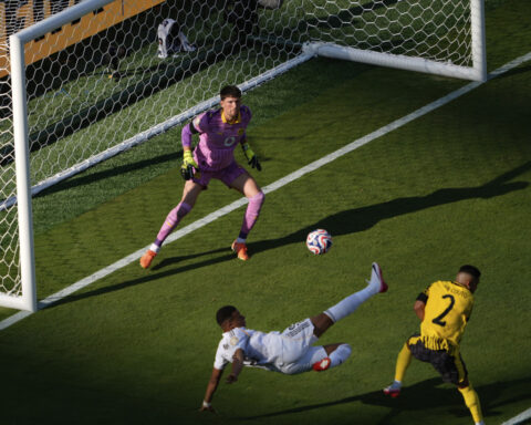 Real Madrid beats Dortmund 3-2 after 3 stoppage-time goals, plays PSG in Club World Cup semifinals