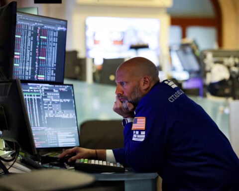 Wall St knocked lower by tariff jitters; Musk's political plan hits Tesla
