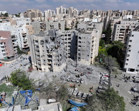 Israeli military official says Iran hit some military sites last month