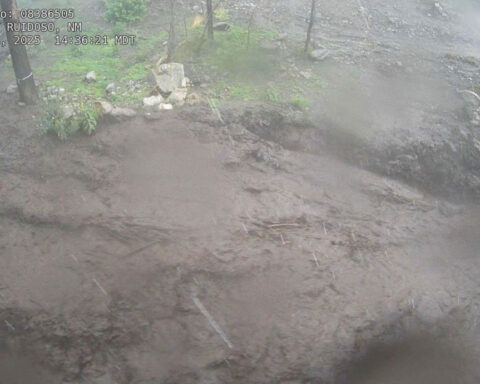 Flash flood hits New Mexico mountain town, leaving at least 3 dead