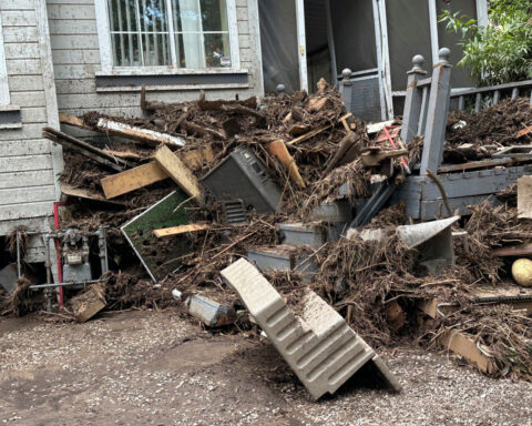 Flash flooding that killed 3 leaves New Mexico village heartbroken, anxious as cleanup begins