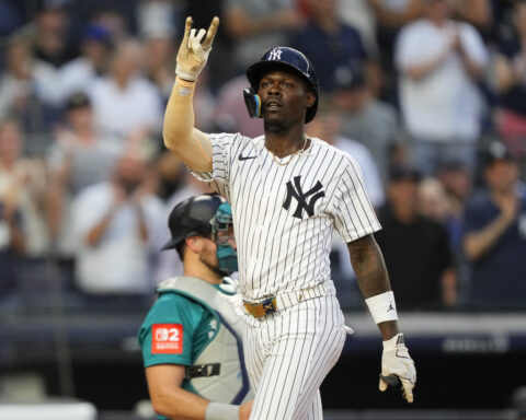 Chisholm homers twice and Schlittler wins MLB debut as Yankees top Mariners 9-6