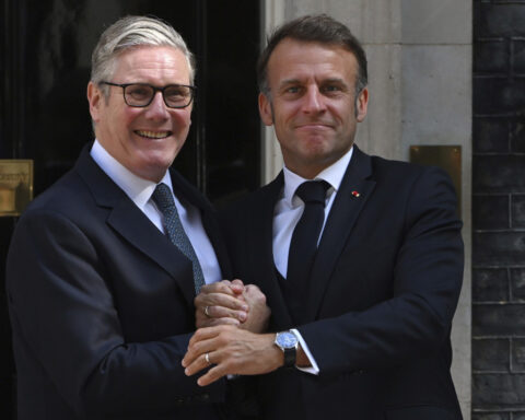 UK and France agree to send some migrants arriving in Britain by boat back to France