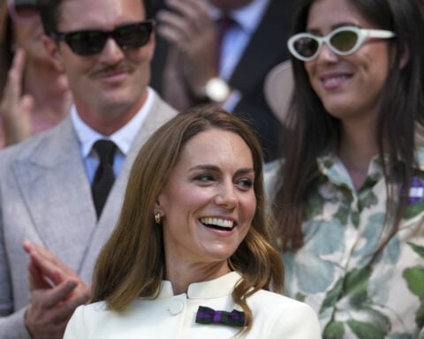 Kate, Princess of Wales, presents Wimbledon winner's trophy to Swiatek, consoling words to Anisimova