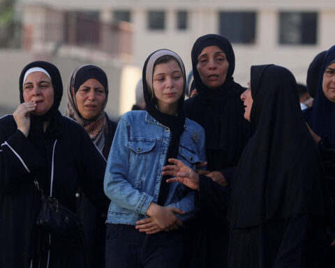Gaza truce talks faltering over withdrawal; 17 reported killed in latest shooting near aid