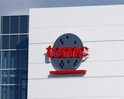 TSMC posts record quarterly profit on AI demand, but wary about tariffs