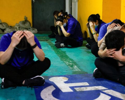 Sirens wail, cities shut down as Taiwan simulates Chinese air raid