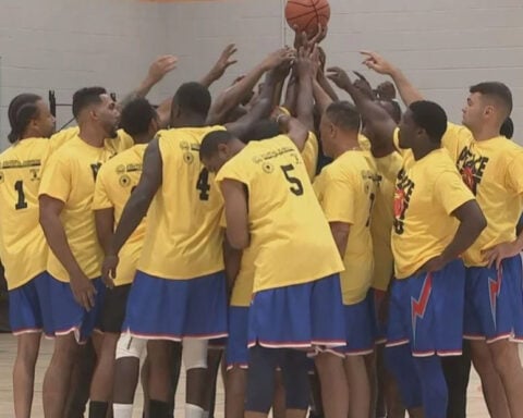 Police, firefighters join anti-violence activists for "Peace Not Guns" basketball game