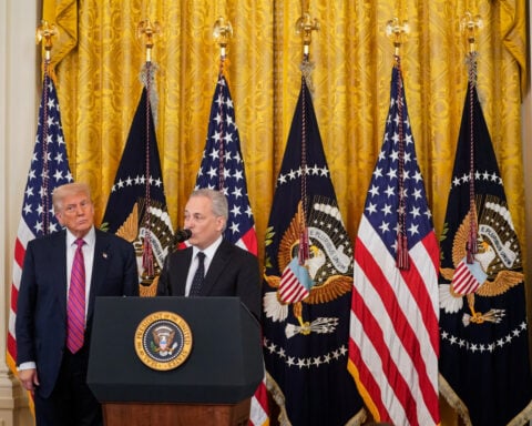 Trump signs stablecoin law as crypto industry aims for mainstream adoption