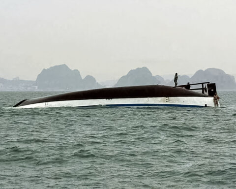 Rescuers search for survivors after tourist boat capsizes killing dozens in Vietnam