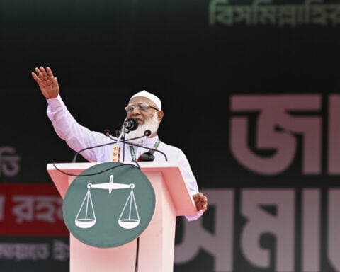 Bangladesh's Islamist party projects force with a big rally in Dhaka