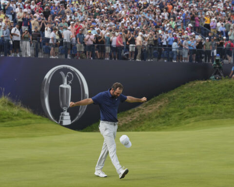 Scottie Scheffler dominates in British Open victory for his 2nd major title this year