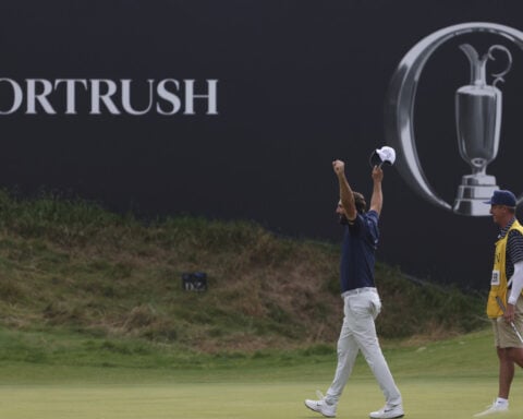 British Open champion Scottie Scheffler says comparisons to Tiger Woods 'a bit silly'