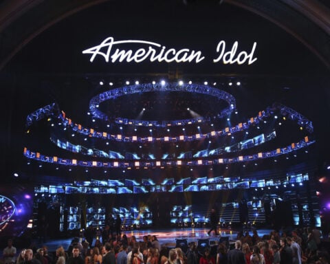 Man charged in the killings of an 'American Idol' exec and her husband called 911 afterward, DA says