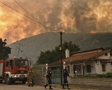 A major forest fire in Greece forces several villages to evacuate