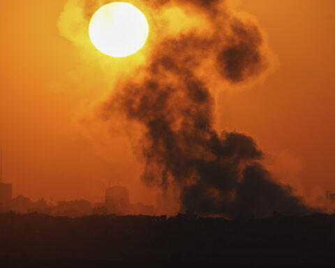 The Latest: Israel is pushing Gaza into starvation, aid groups say