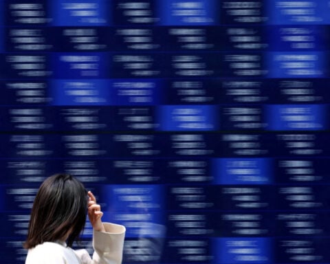 Japan's Topix rallies to record high in trade deal afterglow