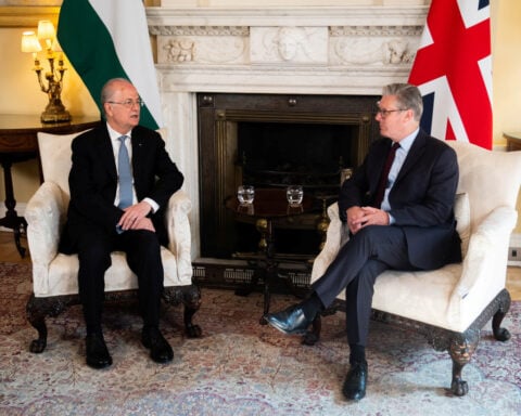 UK backs future Palestinian statehood but only as part of peace deal