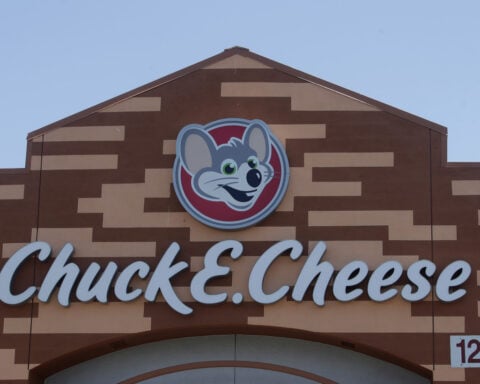 Chuck E. Cheese employee arrested in iconic mouse mask for using stolen credit card, police say