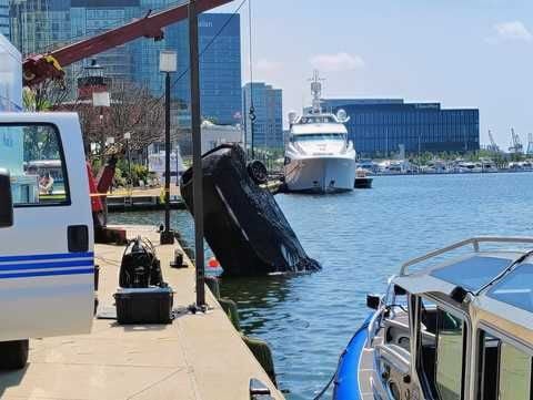 Baltimore police find body inside vehicle pulled from harbor along East Pratt Street